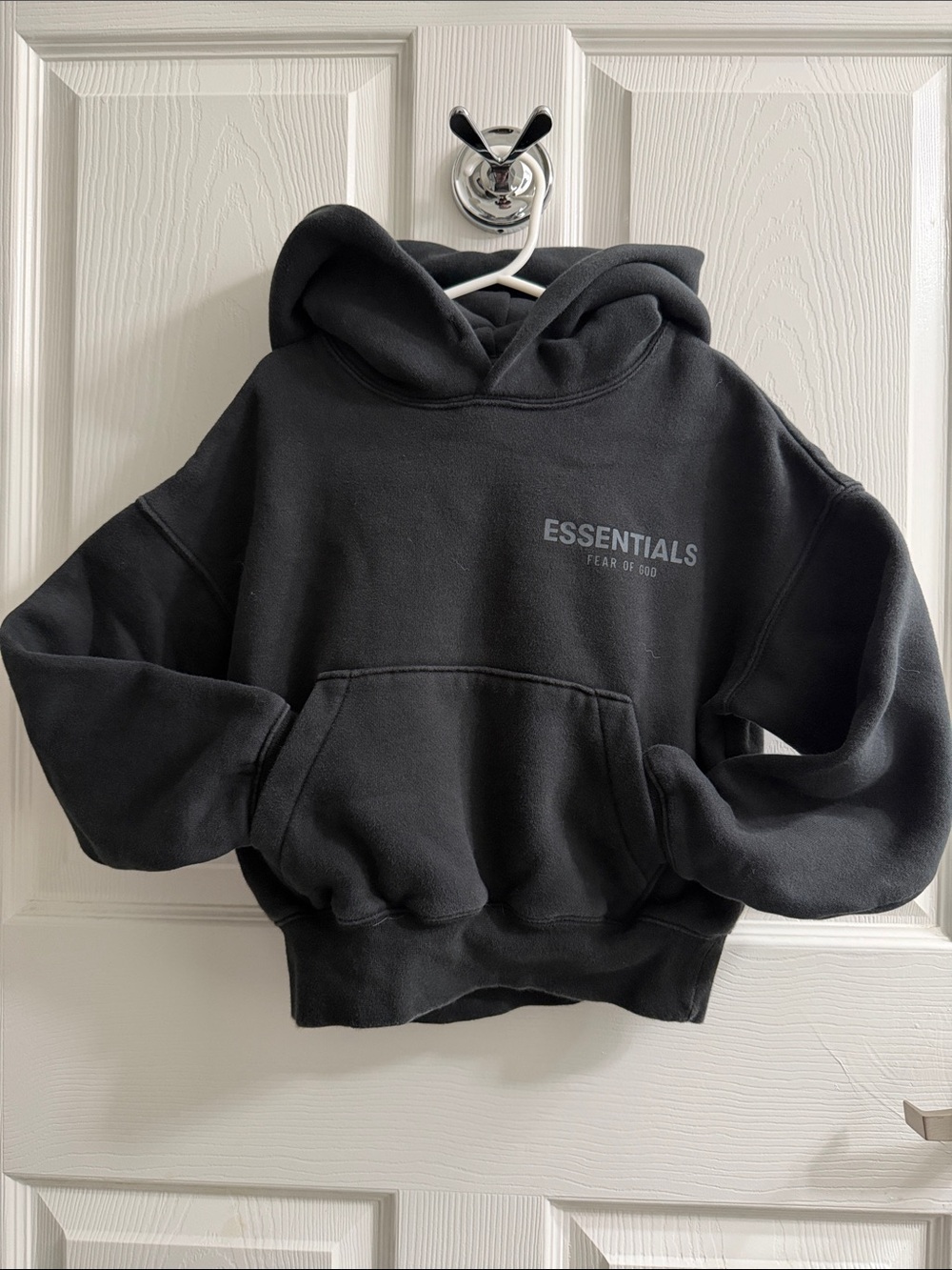 Essentials Black Pullover Hoodie with Subtle Logo